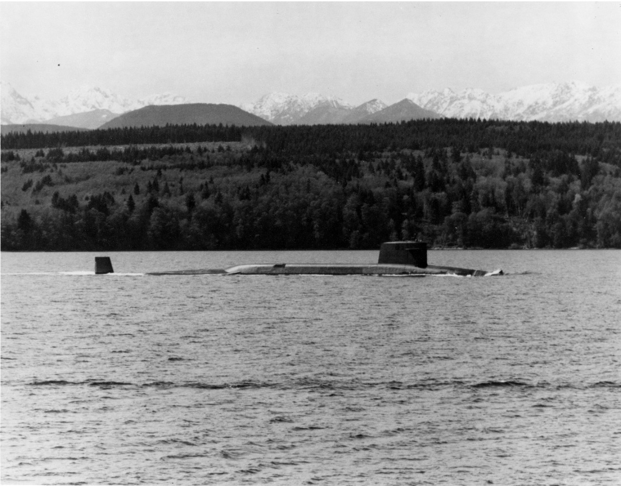 Naval Submarine Base Bangor, WA - a starboard beam view of the attack submarine USS Sam Houston (SSBN-609) underway in the Hood Canal. April 1, 1981.