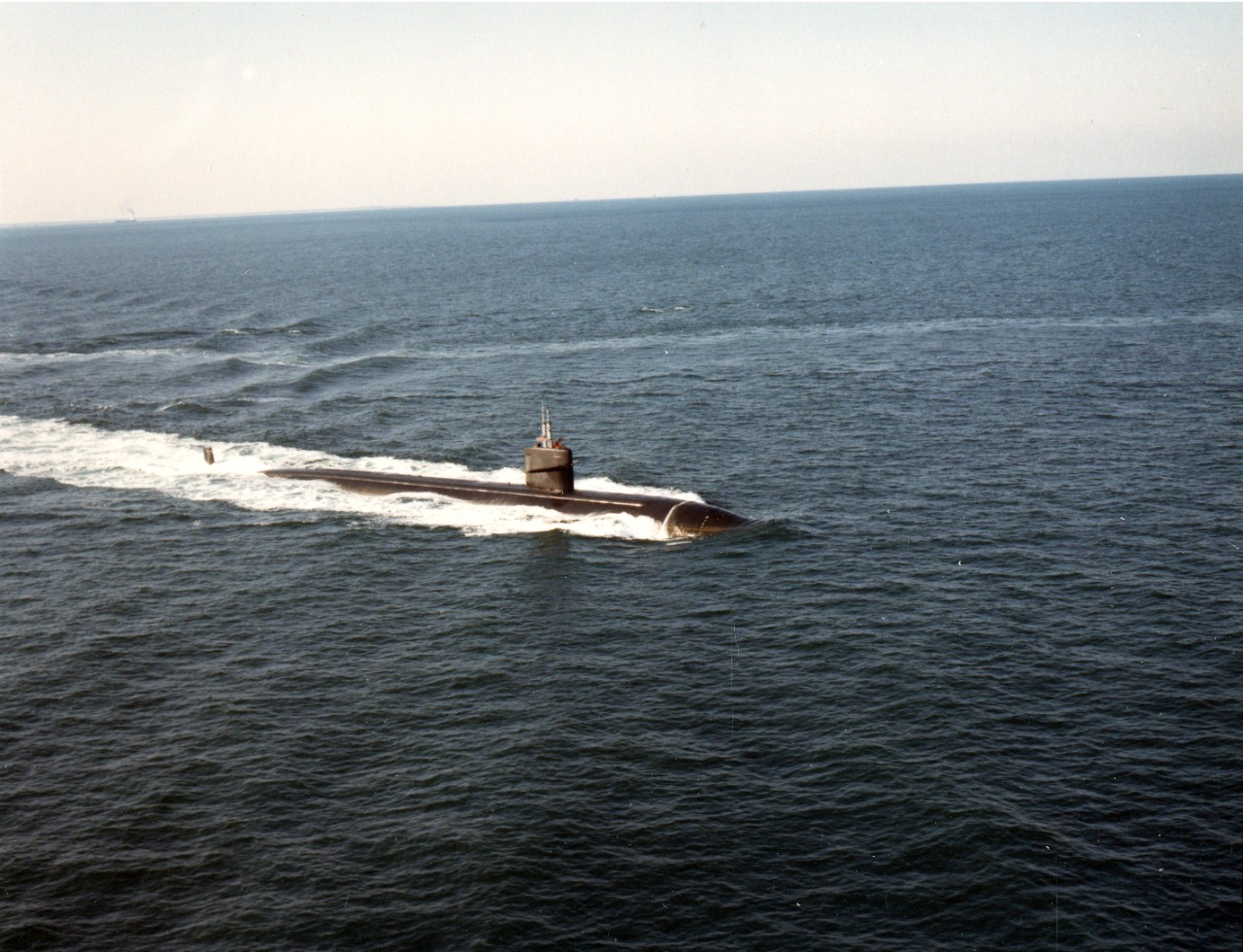 A starboard view of the nuclear-powered attack submarine USS Houston (SSN-713) underway. January 10. 1983. 