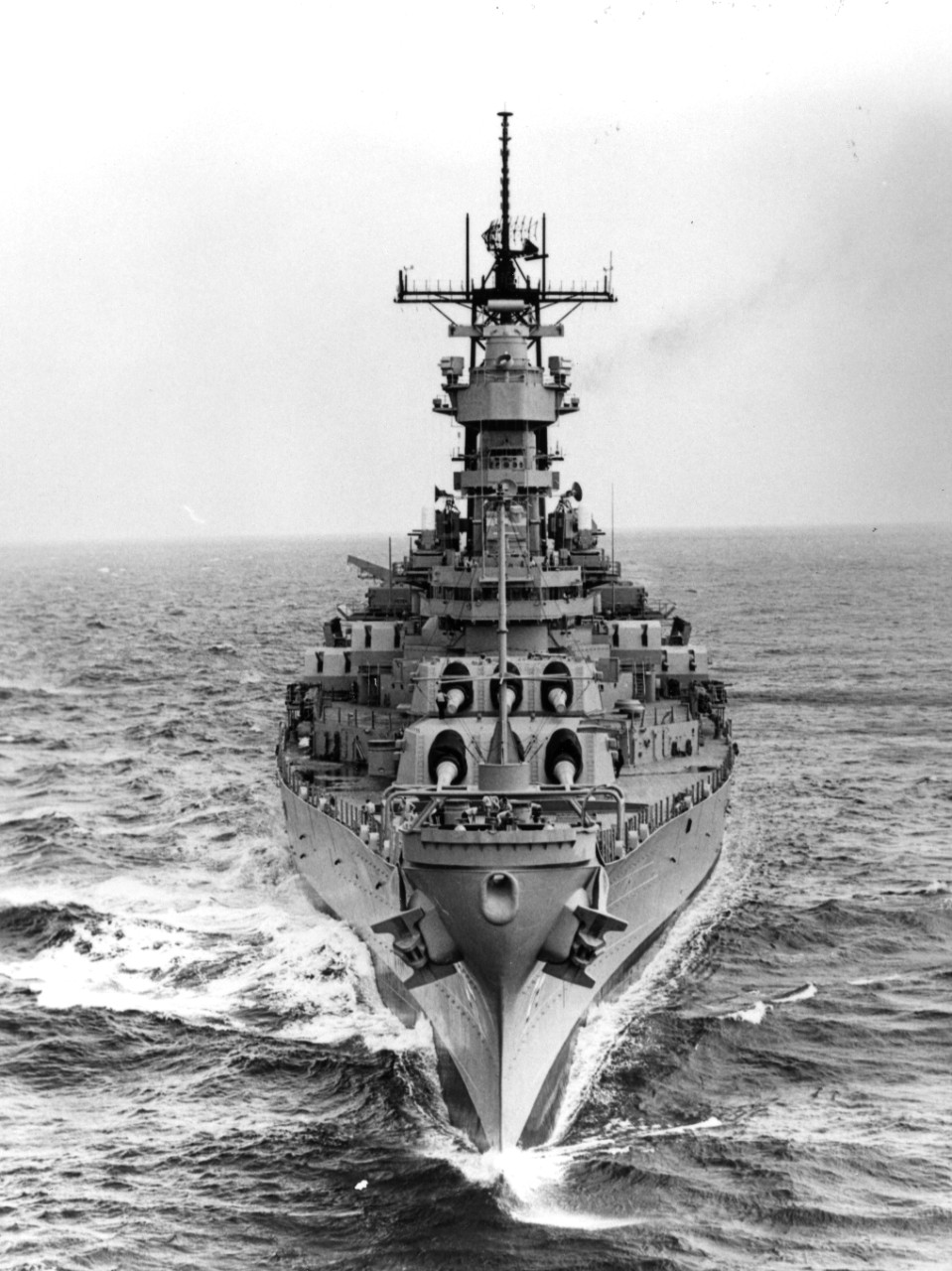 A bow view of the battleship Wisconsin (BB-64) underway during sea trials.