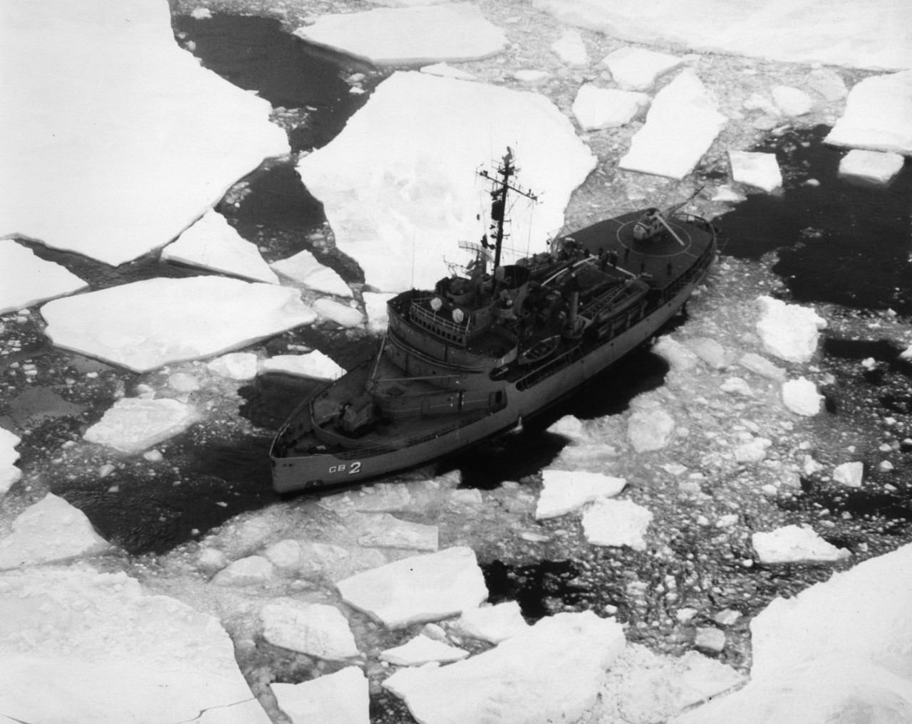 US Navy icebreaker USS Edisto (AGB-2) breaks through an ice pack in the Greenland Sea