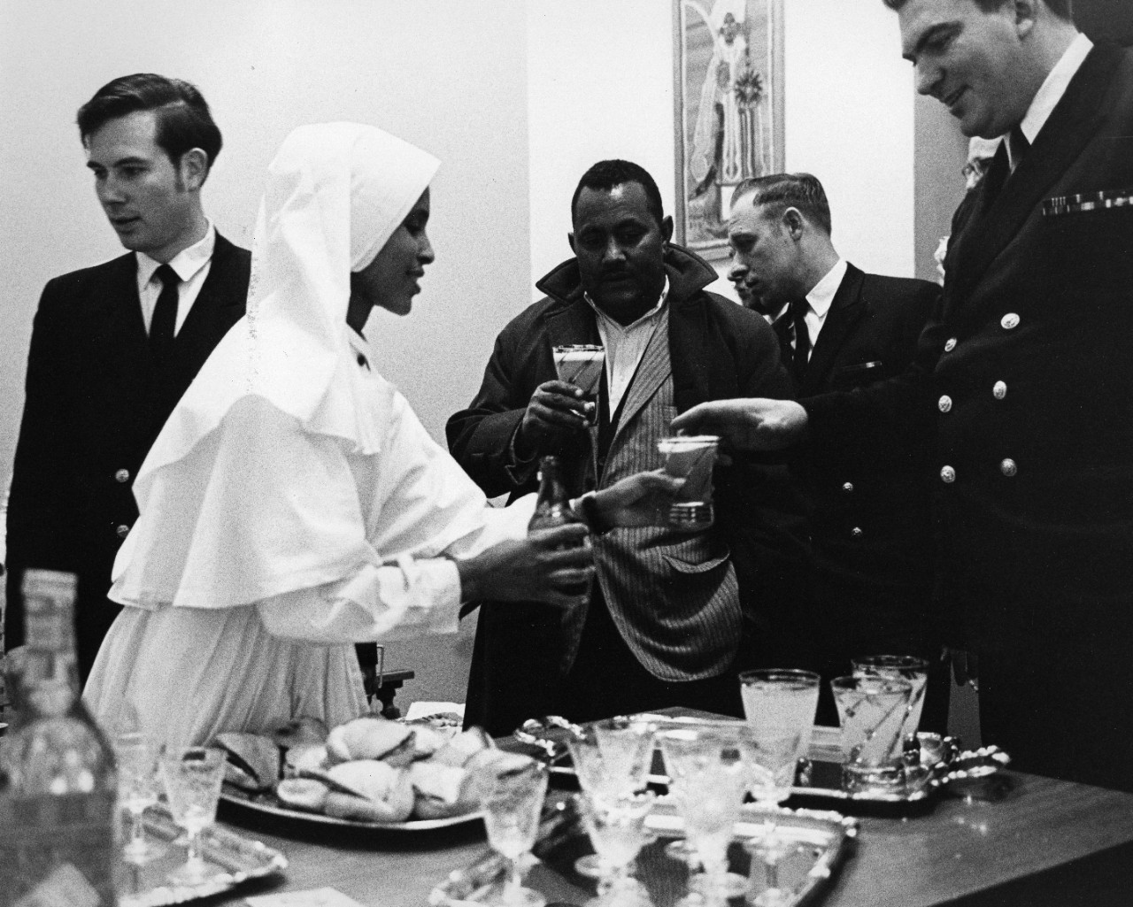 February 1972, Asmara, Ethiopia: The U.S. Sixth Fleet Band members are served refreshments at Asmara’s expo, after playing for the Ethiopian Navy Days celebration. Other bands that participated in the celebration are from France, Great Britain, Sudan, the Soviet Union, Italy, and the host country, Ethiopia.