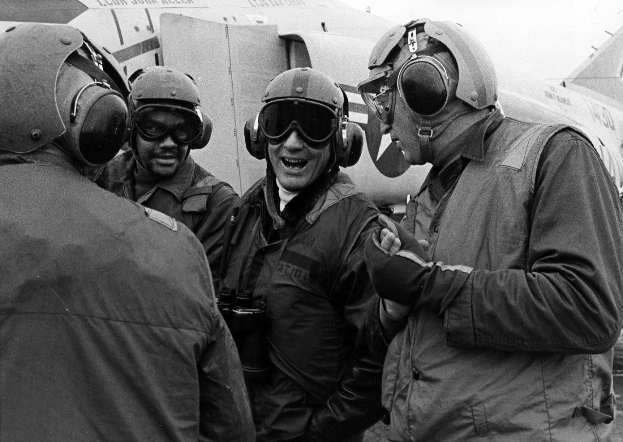 <p>Atlantic Ocean - Secretary of the Navy John W. Warner (second from the right), chats with other observers on the flight deck of the attack aircraft carrier USS John F. Kennedy (CVA-67) during the North Atlantic treaty organization exercise &quot;Strong Express&quot;. September 19, 1972.</p>
