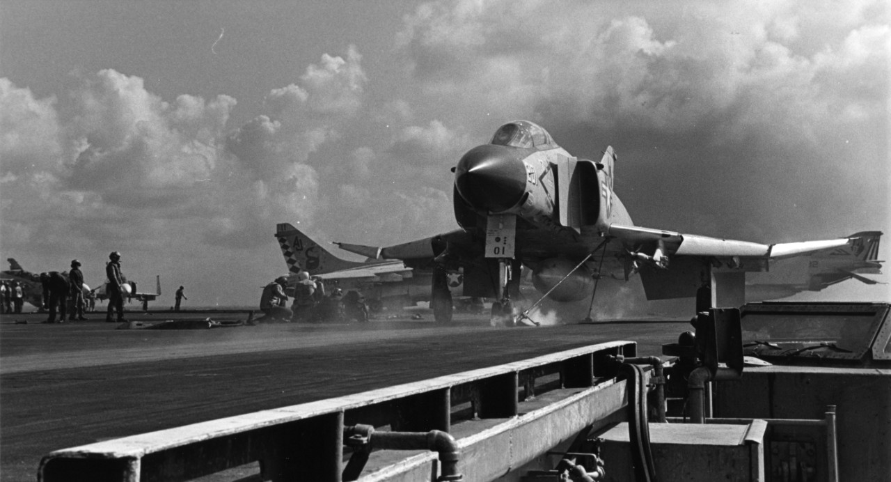 A Fighter Squadron 74 (VF-74) F-4J Phantom II fighter aircraft is ready for launching from the waist catapult of the nuclear powered aircraft carrier USS Nimitz (CVN-68).