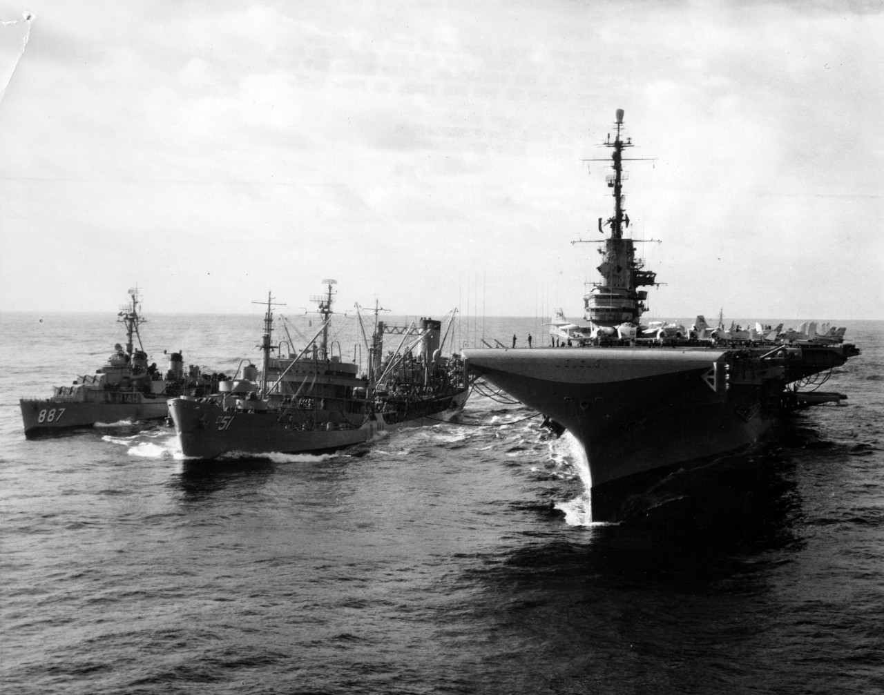 <p>USS Ashtabula (AO-51) refueling the USS Hornet (CVA-12) on the port, and the USS Brinkley Bass (DD-887) on the starboard, while under way with the 7th Fleet in the Far East, 20 February, 1958.</p>
