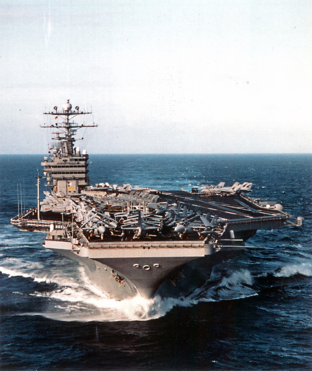 The U.S. Navy’s nuclear powered aircraft carrier USS George Washington (CVN-73) slices through the waters of the eastern Atlantic Ocean, February 3, 1996. Commanded by Captain Malcolm P. Branch, USS George Washington left her homeport of Norfolk, Virginia, on January 26th for a scheduled six month deployment to the Mediterranean. Once on station with Commander Sixth Fleet, she will patrol the waters of the Adriatic in support of NATO Peace Keeping Operation Joint Endeavor.