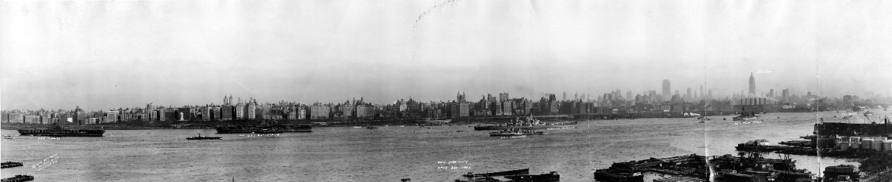 Navy Day, Hudson River, New York City; labeled ships (left to right) are: USS Midway (CVB-41), USS Enterprise (CV-6), USS Isherwood (DD-520), USS Missouri (BB-63), USS New York (BB-34), USS Helena (CA-75); October 27, 1945
