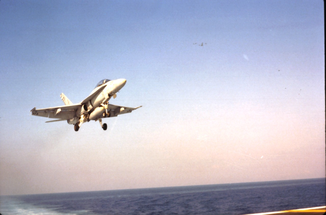 <p>An F/A-18 Hornet from VF-106 approaches USS Dwight D. Eisenhower (CVN-69) for a landing</p>
