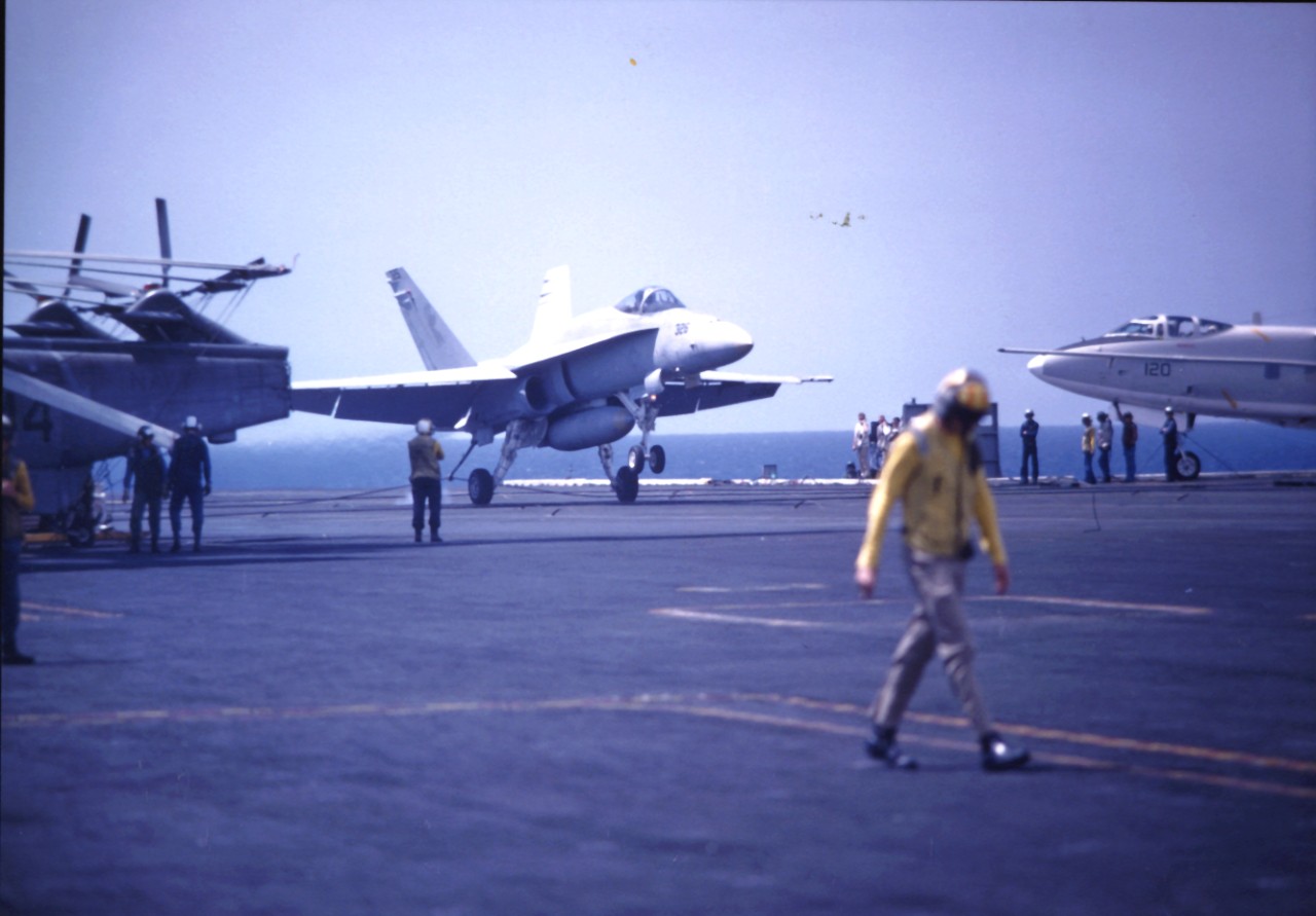 <p>An F/A-18 Hornet aircraft from VFA-106 lands aboard USS Dwight D. Eisenhower (CVN-69)</p>
