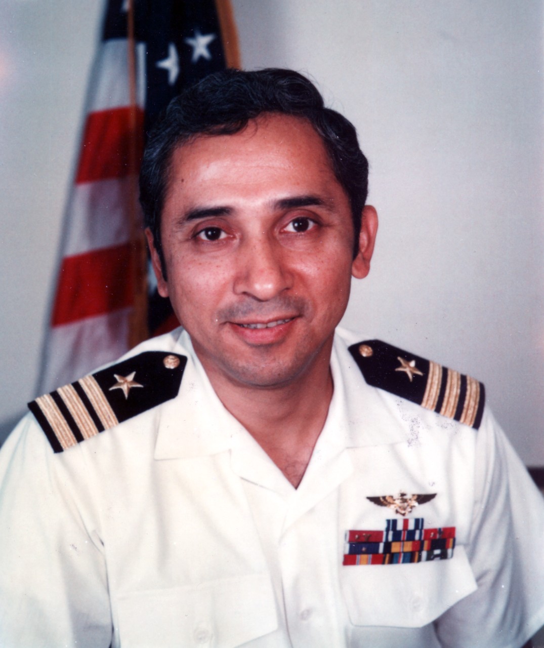 Official portrait of Commander Everett Alvarez Jr., circa 1980.