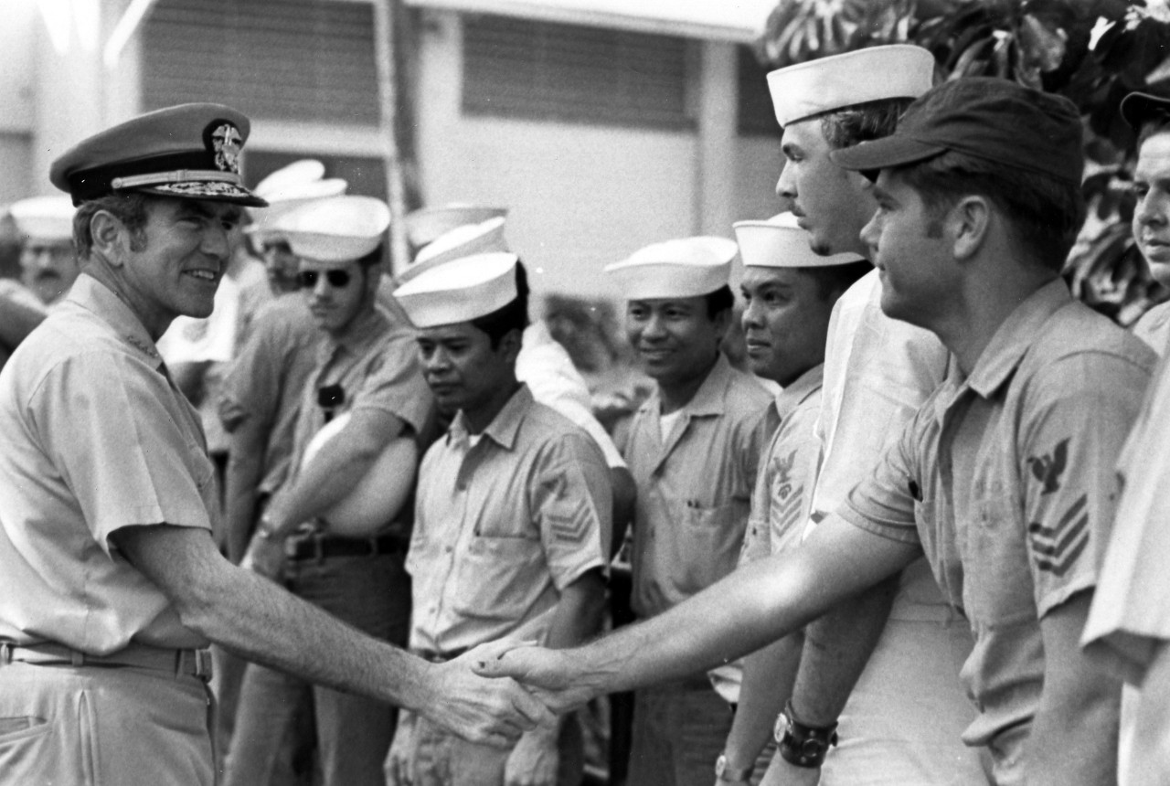 <p>Admiral Elmo R. Zumwalt, Jr., Chief of Naval Operations, greets Oahu-based sailors outside the Submarine Base Theater, c. 1970.&nbsp;</p>
