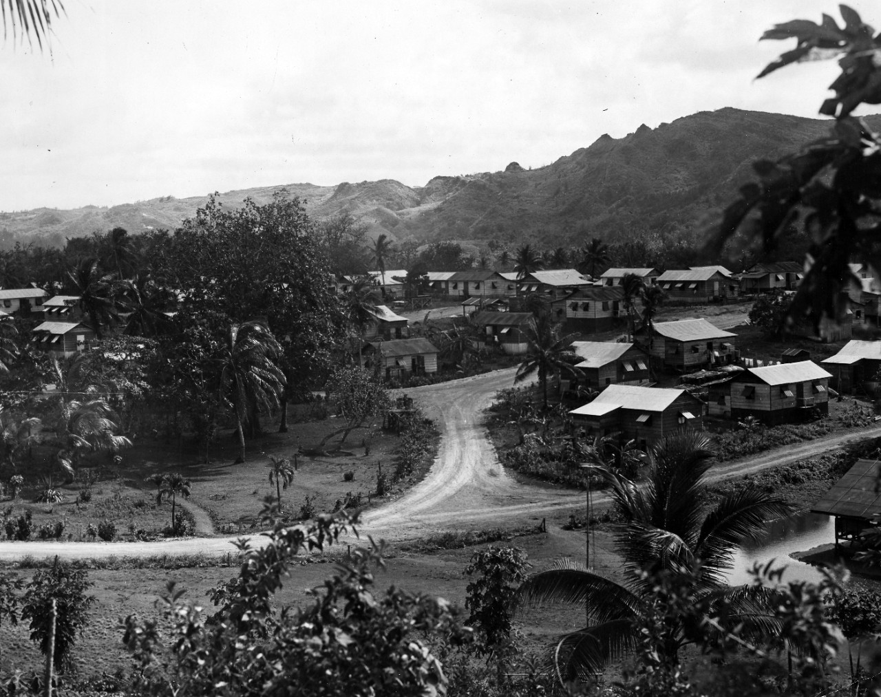 A section of Sinajana village while has displaced the pre-war Agana as the metropolis of Guam and now boasts a population of 3,181 and 444 homes. Contruction of the village was begun by Navy Military Government public works late in 1944. May 15, 1946. 