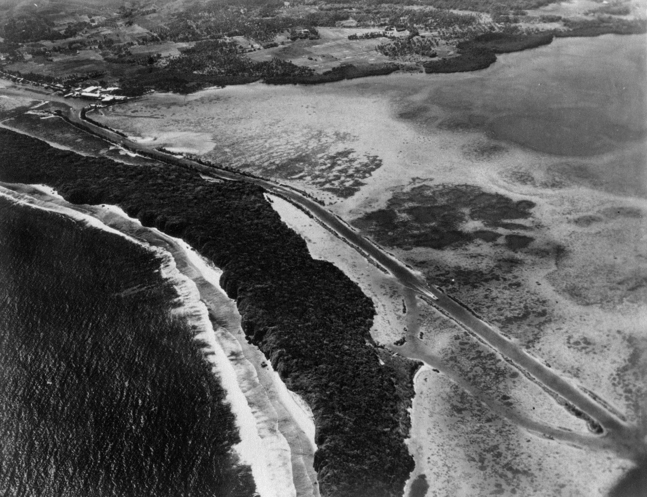 Aerial of Piti, Guam from the north west. Taken from an altitude of 2500'. June 3, 1940. 