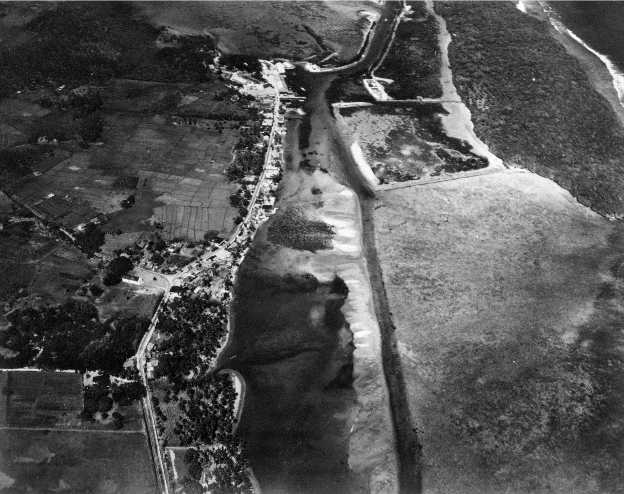 Aerial of Piti, Guam from the east. Taken at an altitude of 2500'. June 3, 1940. 