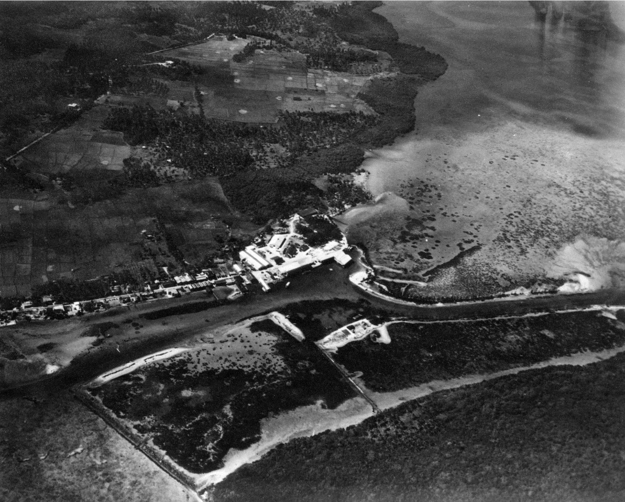 Aerial of Piti, Guam from the north east. Taken from an altitude of 2500'. June 3, 1940. 