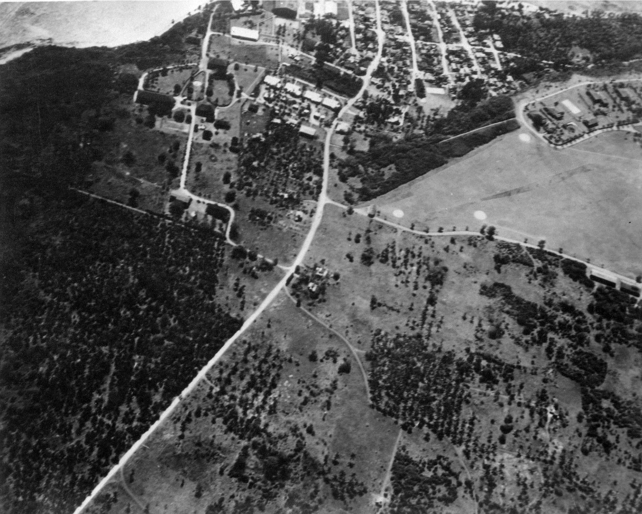Aerial of Sumay, Guam from the south west. Taken from an altitude of 2500'. June 3, 1940. 