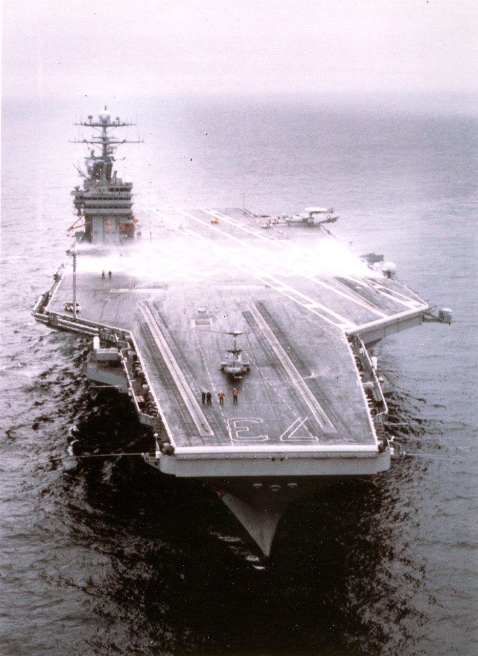 Nuclear-powered aircraft carrier USS George Washington (CVN-73) conducts a test of her counter-measure washdown system while operating in the Virginia Capes, February 28, 1997. USS George Washington (CVN-73) had just completed an unprecedented and highly successful six-month Planned INcremental Availability (PIA) at Norfolk Naval Shipyard and was conducting post-shipyard sea trials. 
