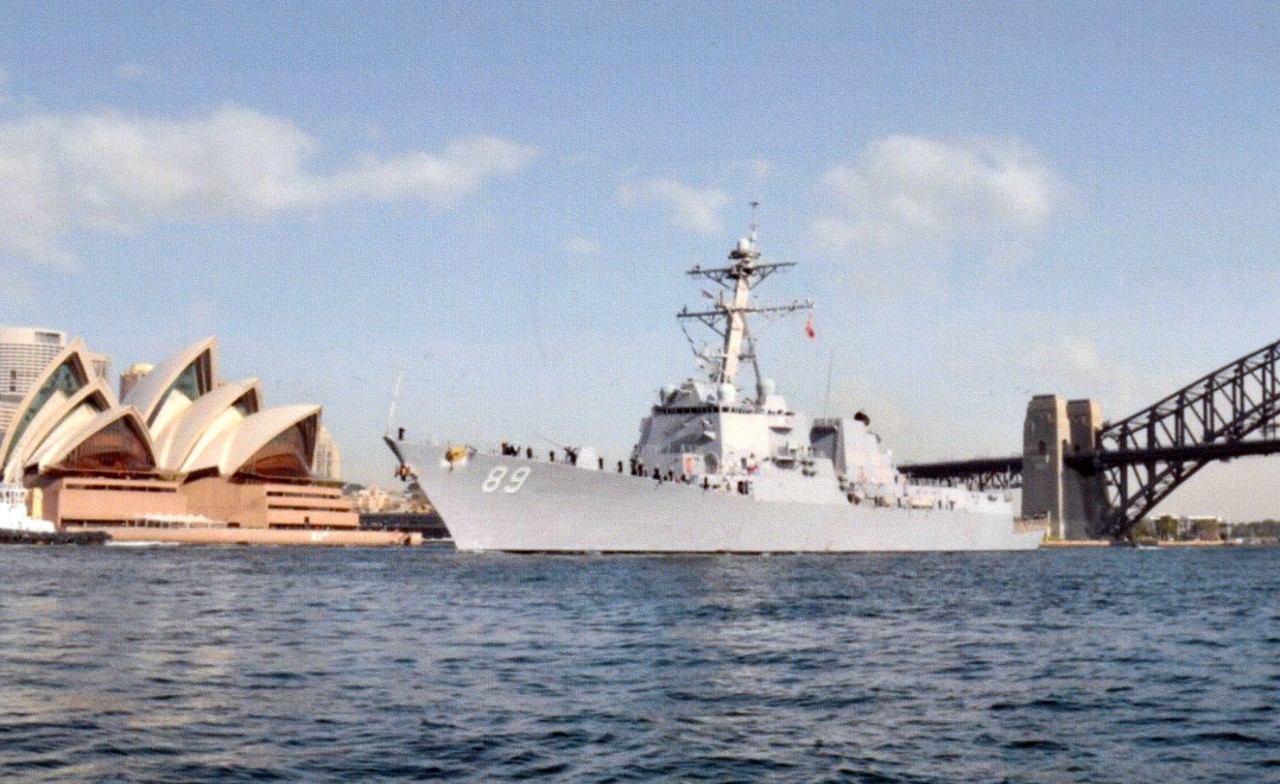 USS Mustin (DDG-89) transits through Sydney Harbor after completing a scheduled port visit in Sydney, Australia.