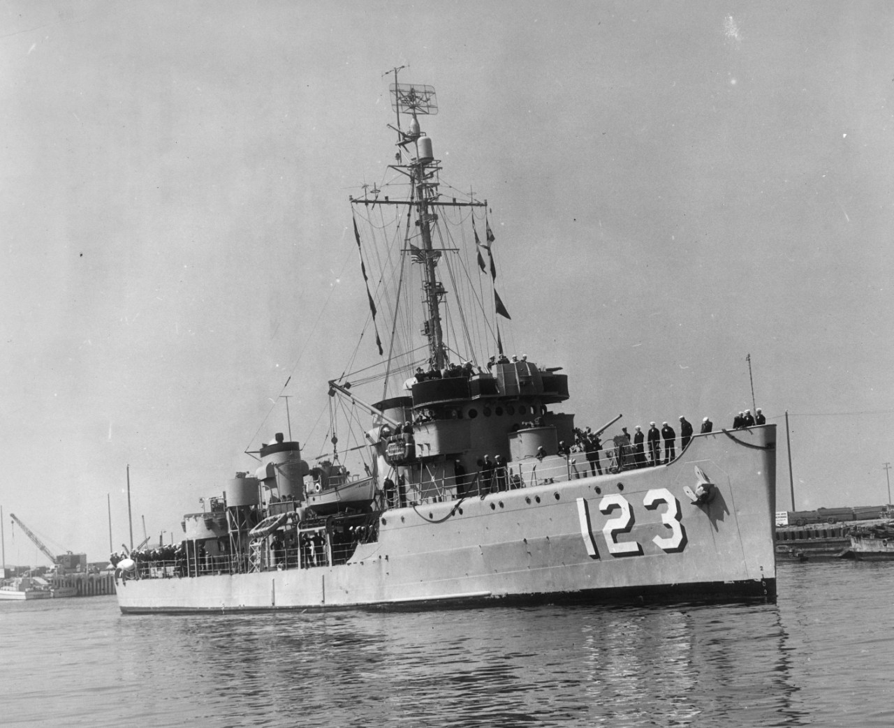 Minesweeper USS Symbol (AM-123) warping into her home port, Long Beach Naval Station, after sweeping mines off the North Korean coast for the past ten months.