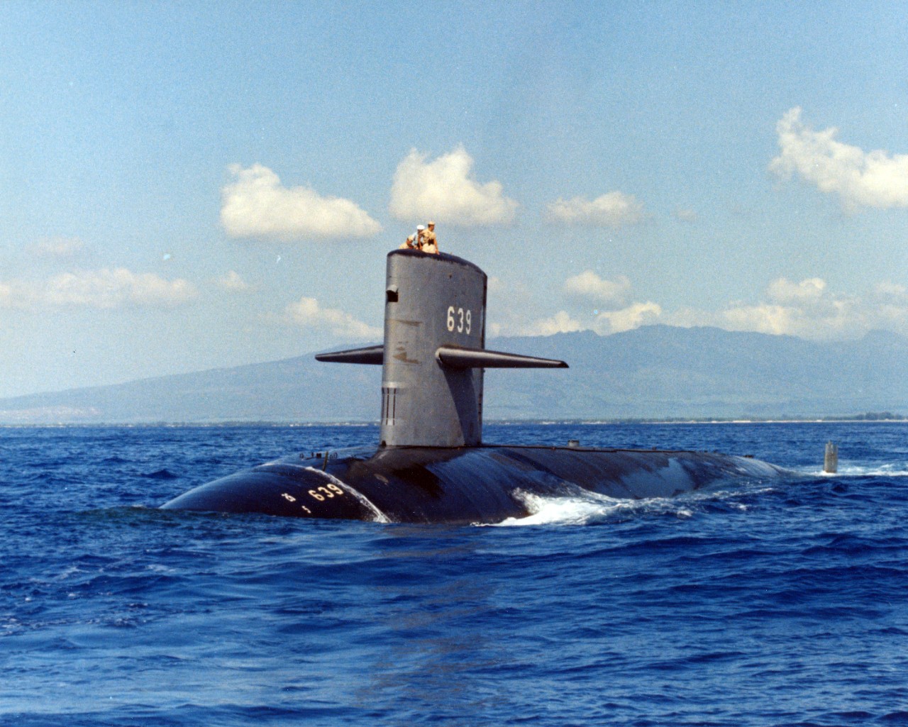 Nuclear powered attack submarine USS Tautog (SSN-639) underway on the surface