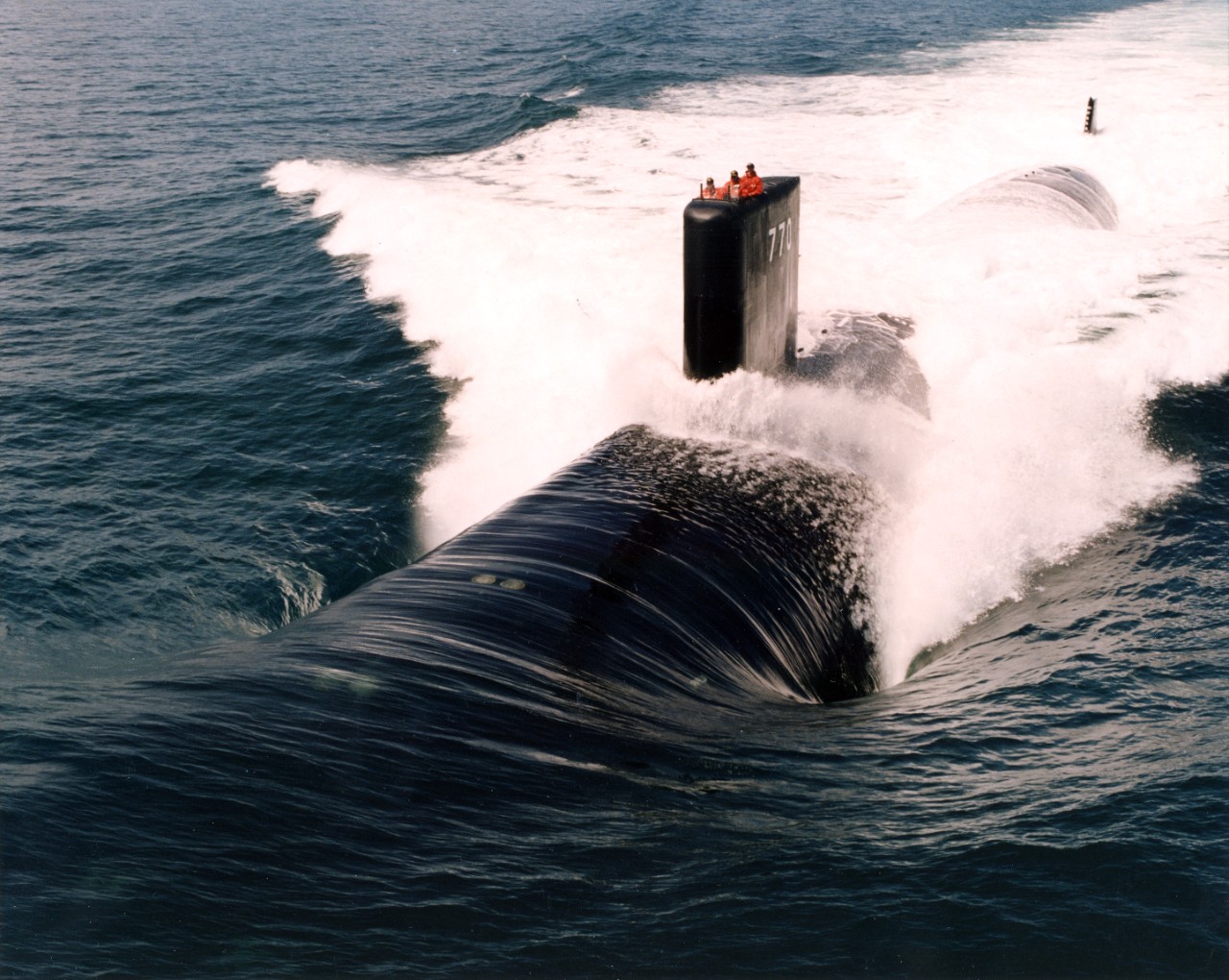 Aerial view of nuclear powered attack submarine USS Tucson (SSN-770) underway on sea trials