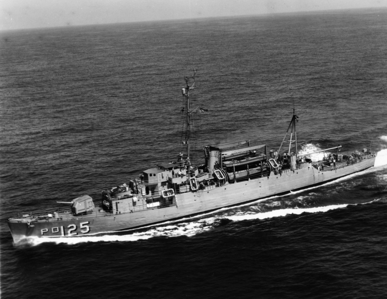 Aerial view of high speed transport USS Wantuck (APD-125) underway