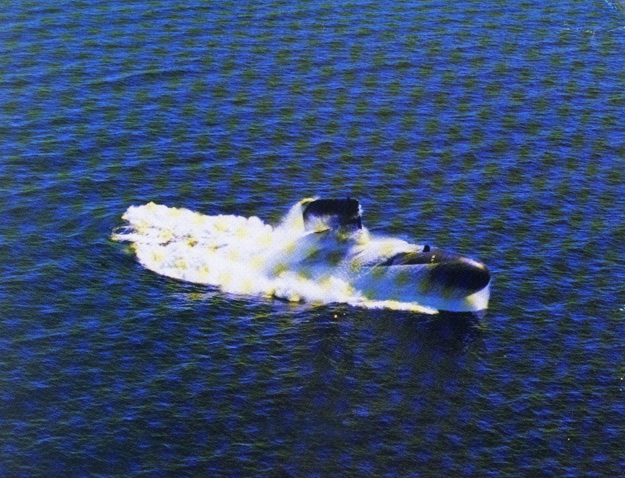 <p>Aerial starboard view of USS Drum (SSN-667) at sea. Date unknown.</p>
