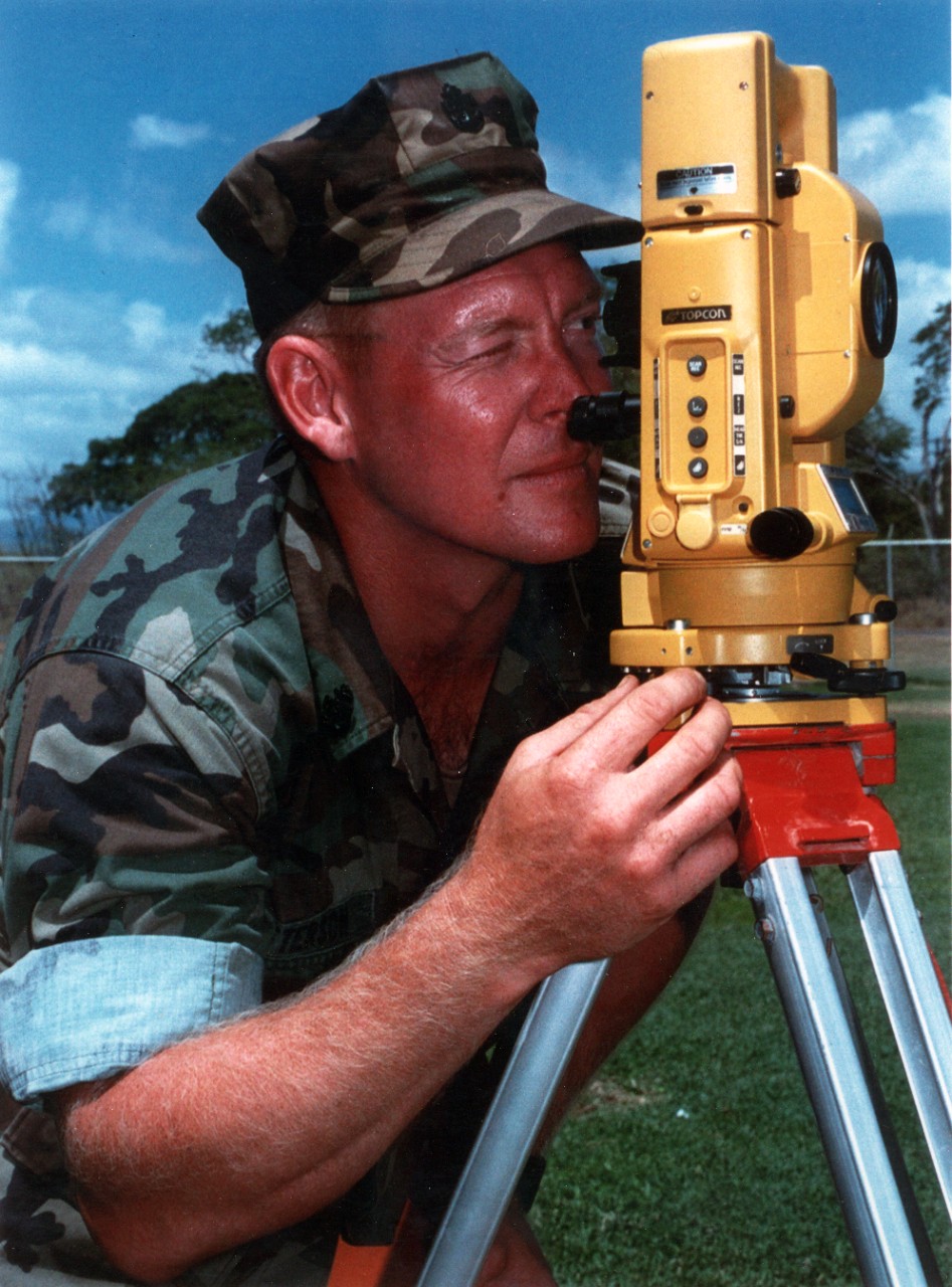 Navy Builder Chief Paul Patterson surveys underground cable locations on board Naval Air Station Barbers Point, Hawaii.
