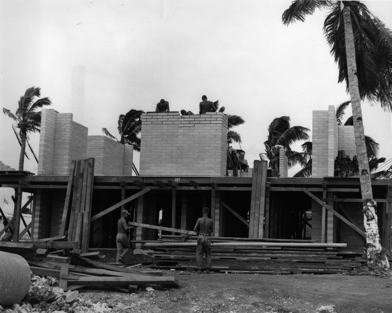Up goes another housing unit on the Mariana Islands. This is one of many units being constructed at NAS by Mobile Construction Battalion 10 Seabees.