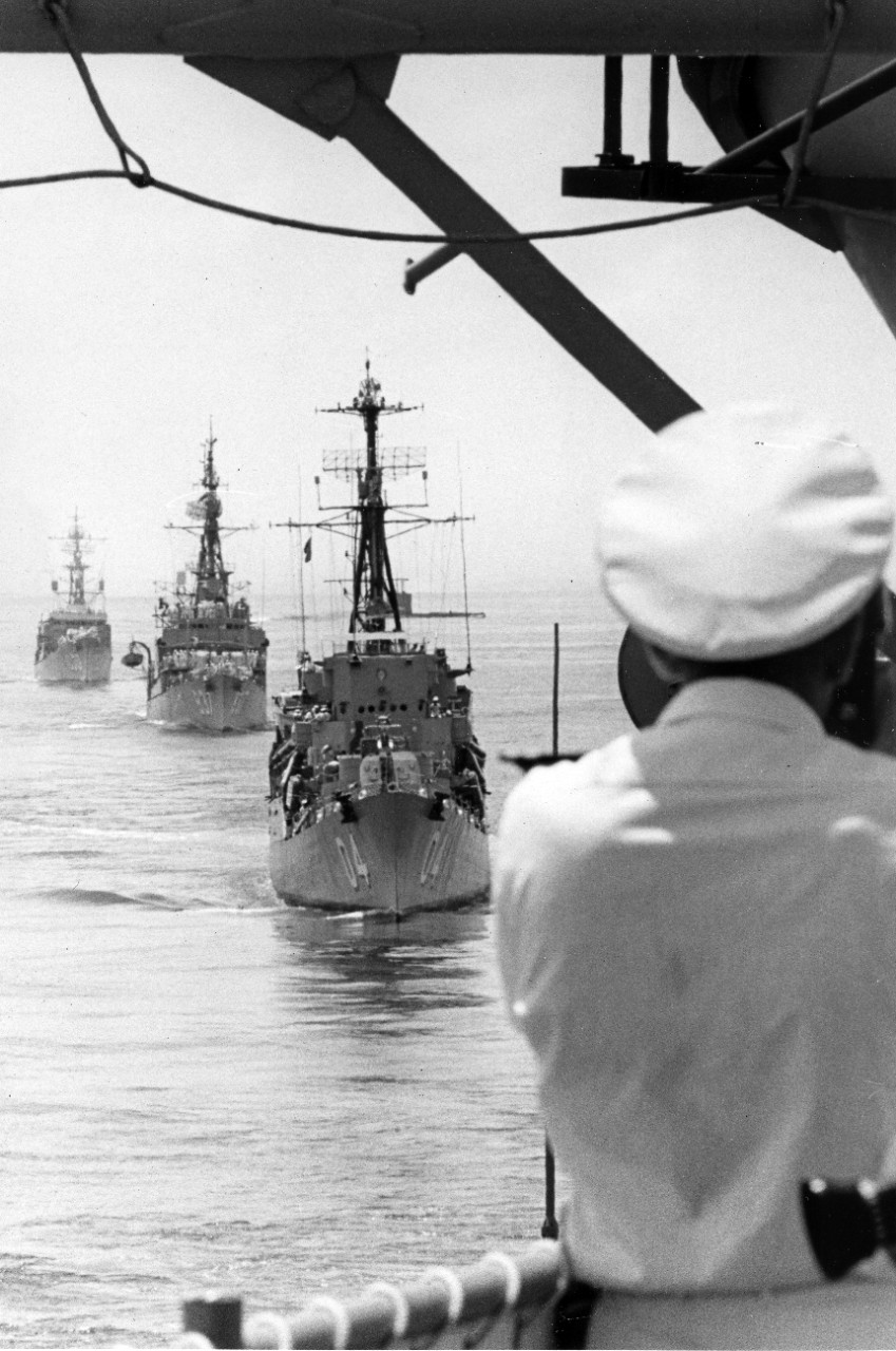 Approaching the UNITAS X flagship USS Leahy are (front to back) the Columbian destroyer ARC Almirante Tono, US destroyer USS Sarsfield and US destroyer escort USS J.K. Taussig. August , 1969. 