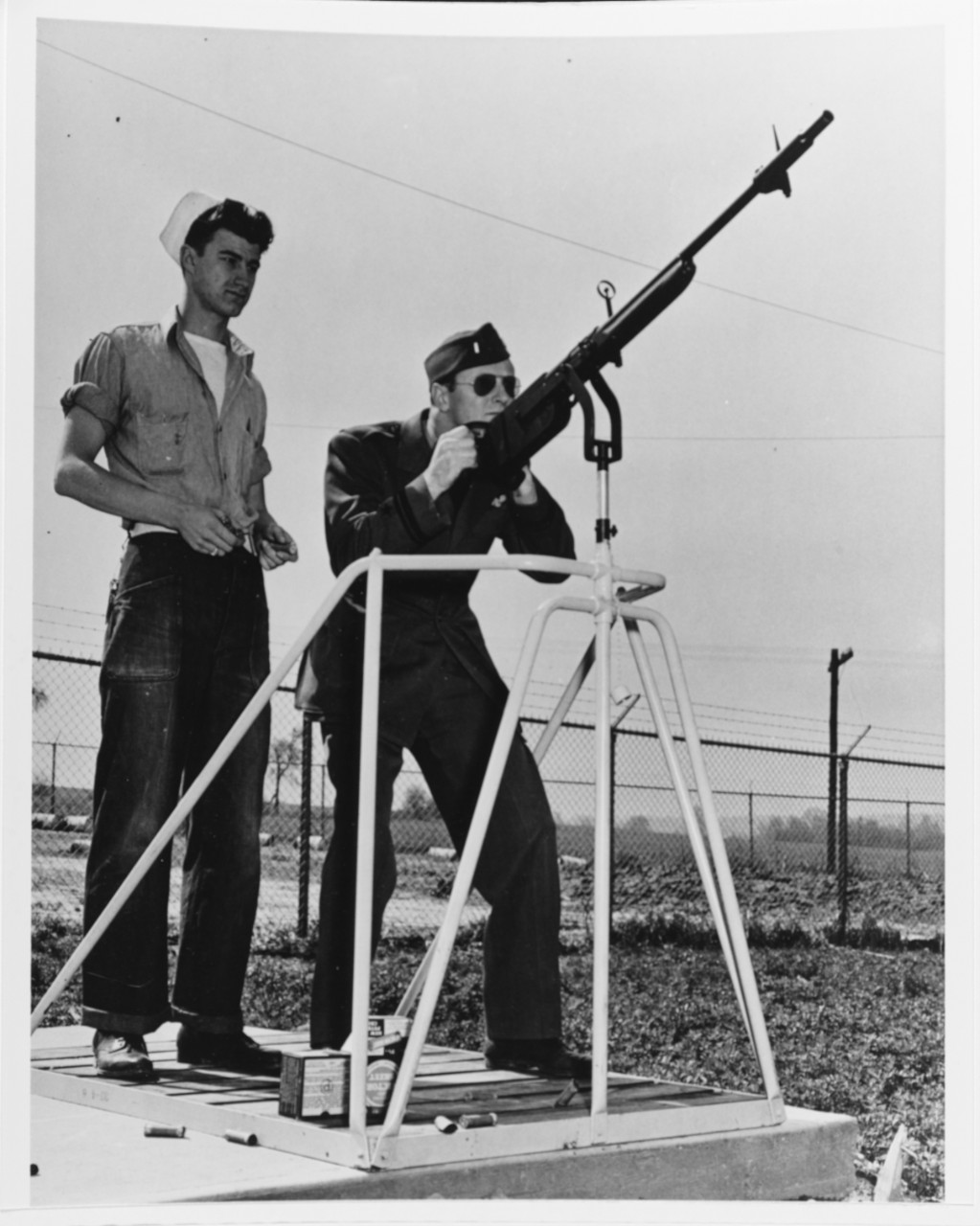Shotgun on machinegun type mounting, for training aerial gunners.
