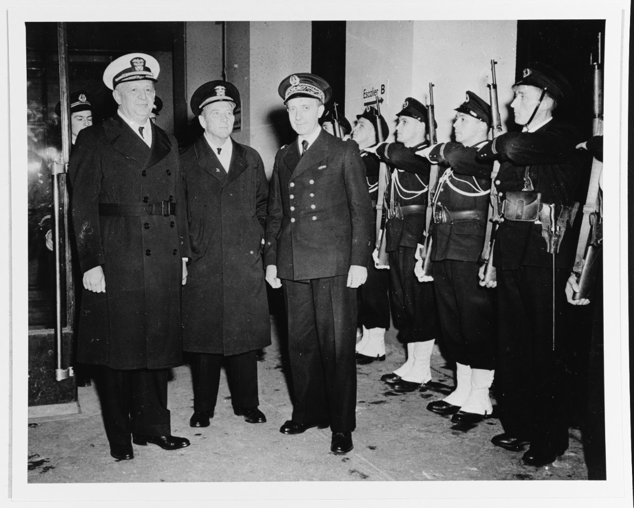 Admiral Henry Kent Hewitt, USN; Vice Admiral Alan G. Kirk, USN, Commander, U.S. Naval Forces, France; Vice Admiral A.G. Lemonnier, Chief of staff, French Navy.