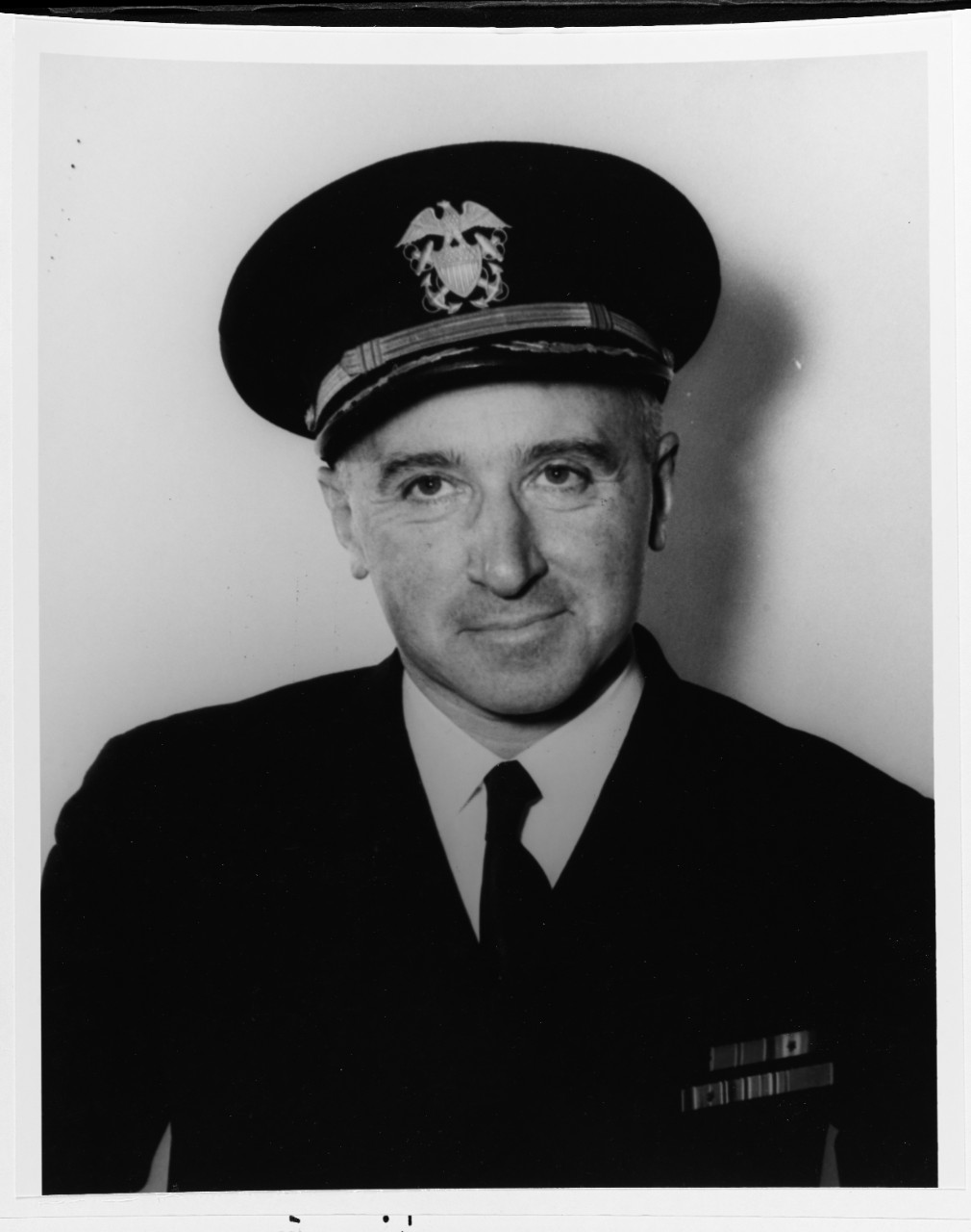 Captain Robert J. White, USNR (Chaplain Corps)