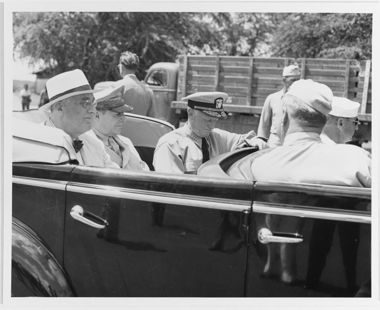 President Franklin D. Roosevelt, General Douglas MacArthur, and Admiral Chester W. Nimitz