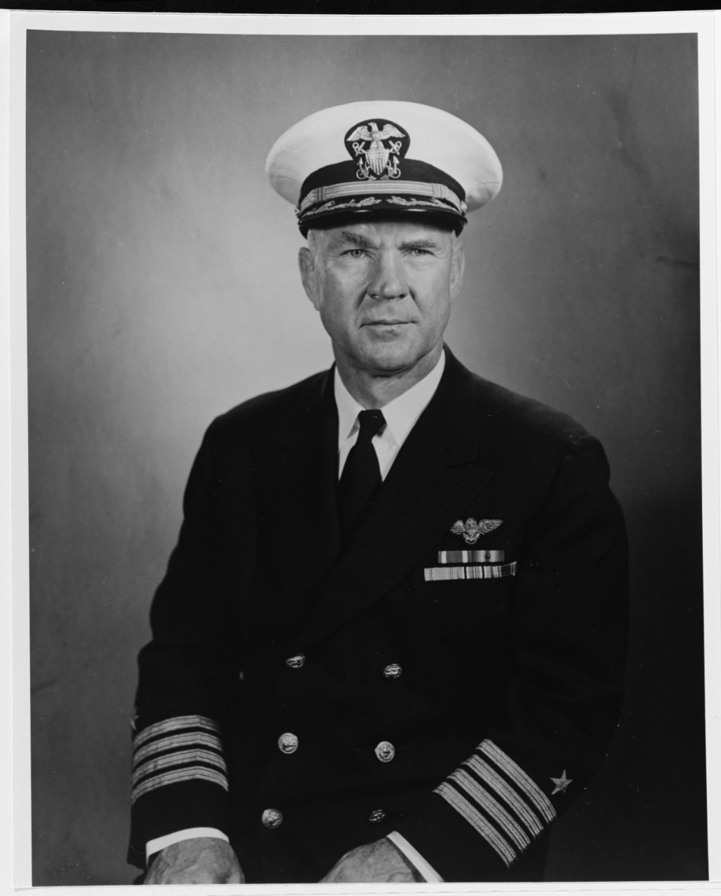 Captain John E. Pixton, USN