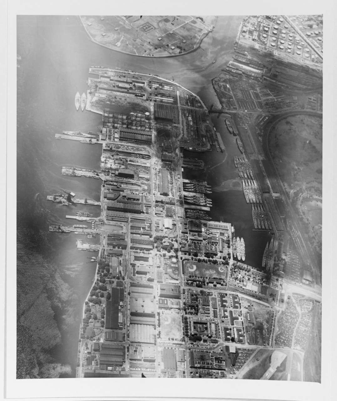 Aerial view of the Philadelphia Navy Yard and Reserve Fleet Basin, 8 June 1954.