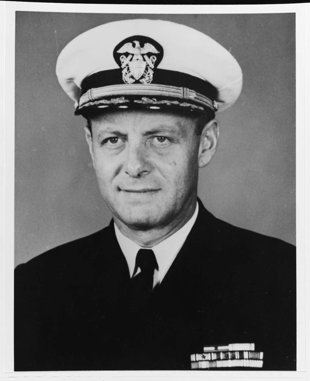 Commander Caesar M. Grassino, USN (Supply Corps)