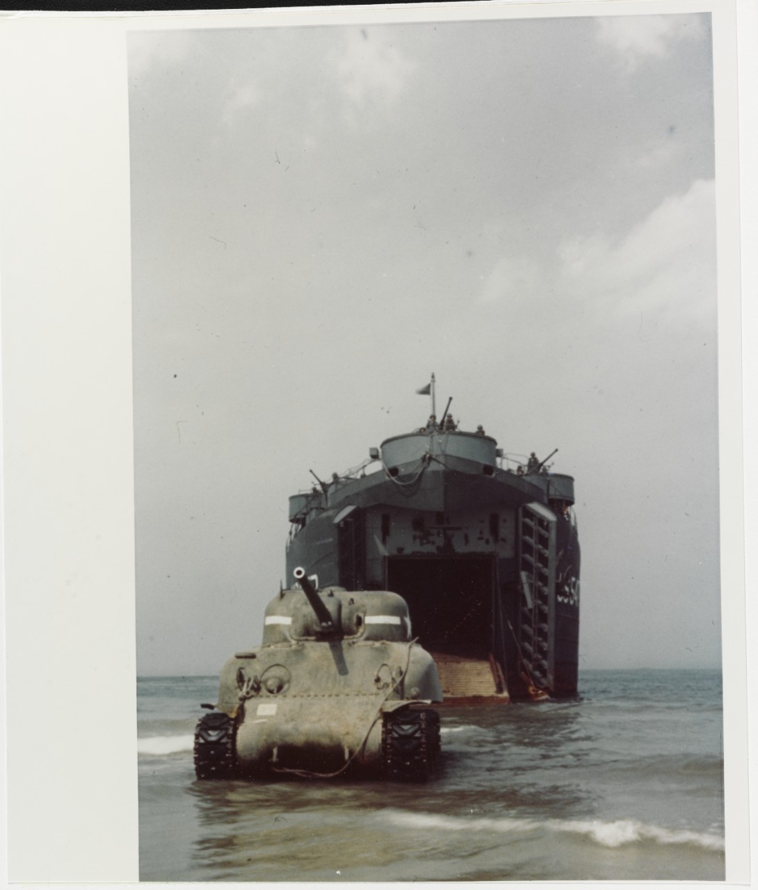 USS LST-547 lands an Army "Sherman" Tank, 1944