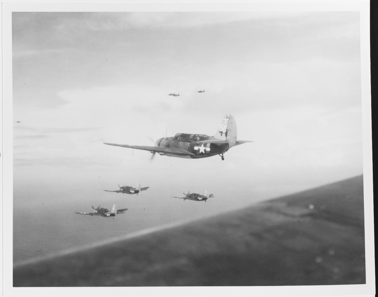 CURTISS SB2C-3 Bombers of VB-18 on patrol over the Philippine Sea, 15 November 1944