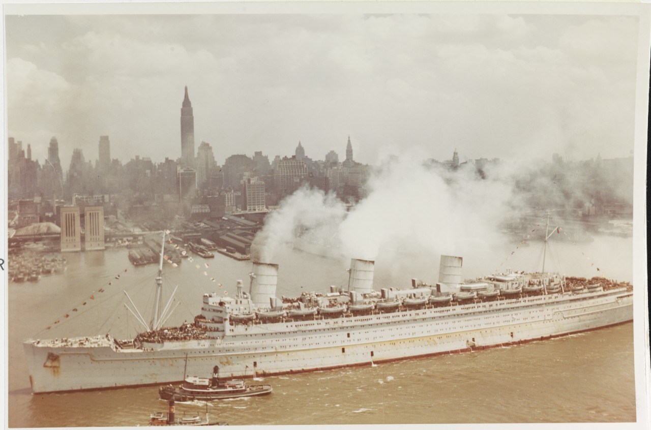 QUEEN MARY arrives in New York City with thousands of U.S. troops on board, 20 June 1945