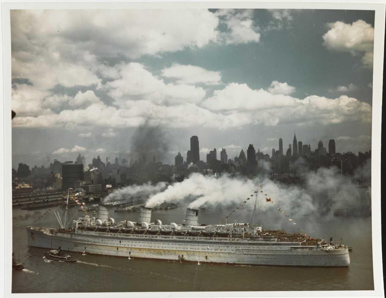 QUEEN MARY arrives in New York City with thousands of U.S. troops on board, 20 June 1945