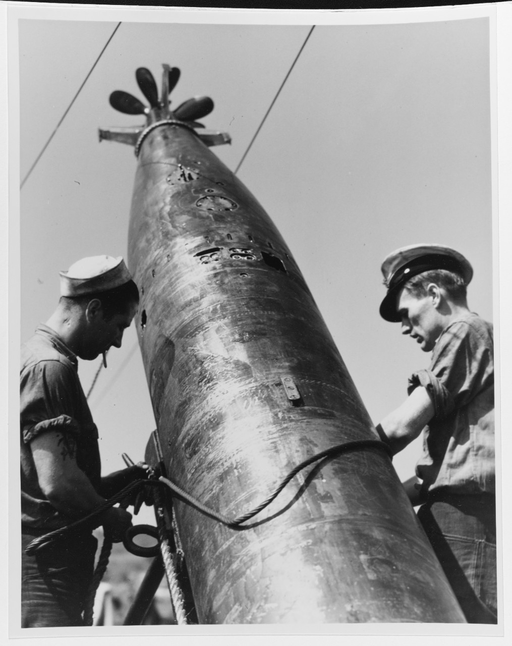 Loading Torpedoes on a Submarine