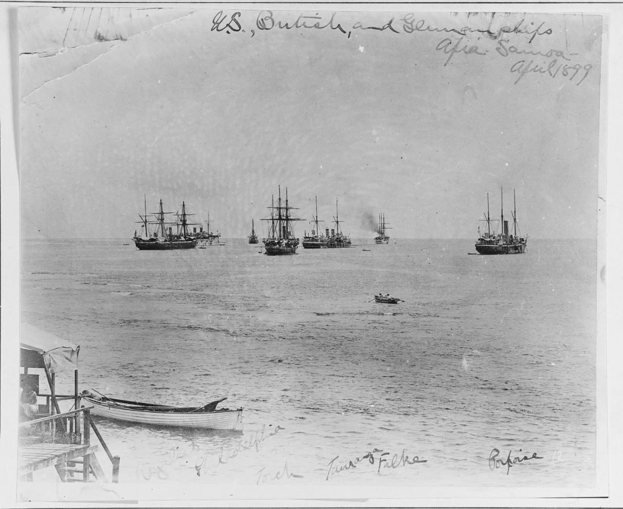 H.M.S. ROYALIST; USS PHILADELPHIA (C-4); H.M.S. TORCH; H.M.S. TAURANGA; German cruiser FALKE; and H.M.S. PORPOISE, at Apia, Samoa, April 1899. 