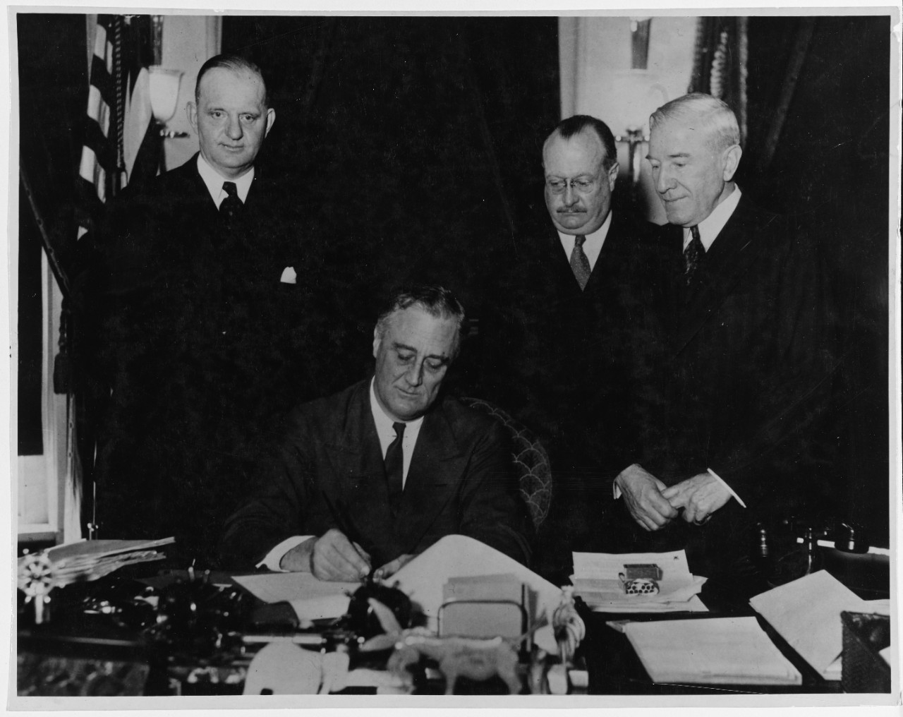 President Franklin D. Roosevelt signs the Vinson-Trammel Act 