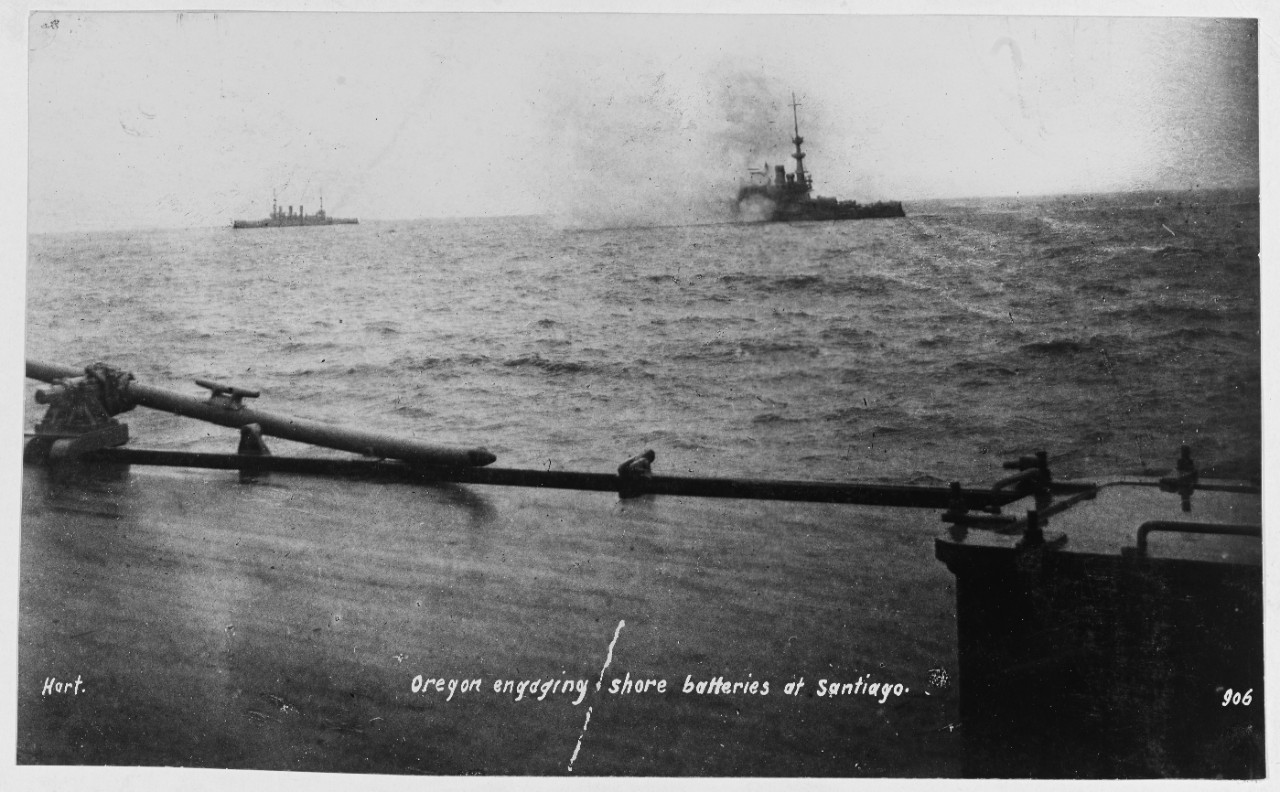 Spanish-American War - USS OREGON (BB-3) engaging the shore batteries at Santiago, Cuba