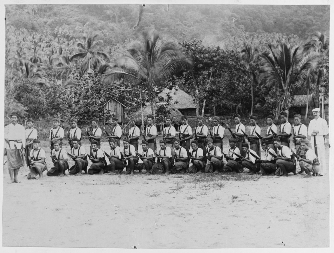 Native guard at drill, Samoa, 1900-1901.