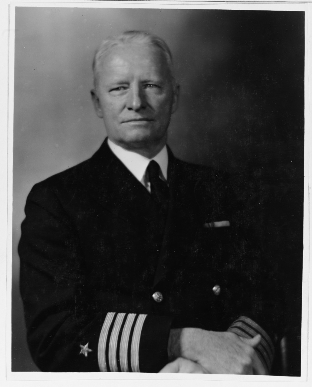 Portrait of Captain Chester W. Nimitz, USN, in blues, uncovered.