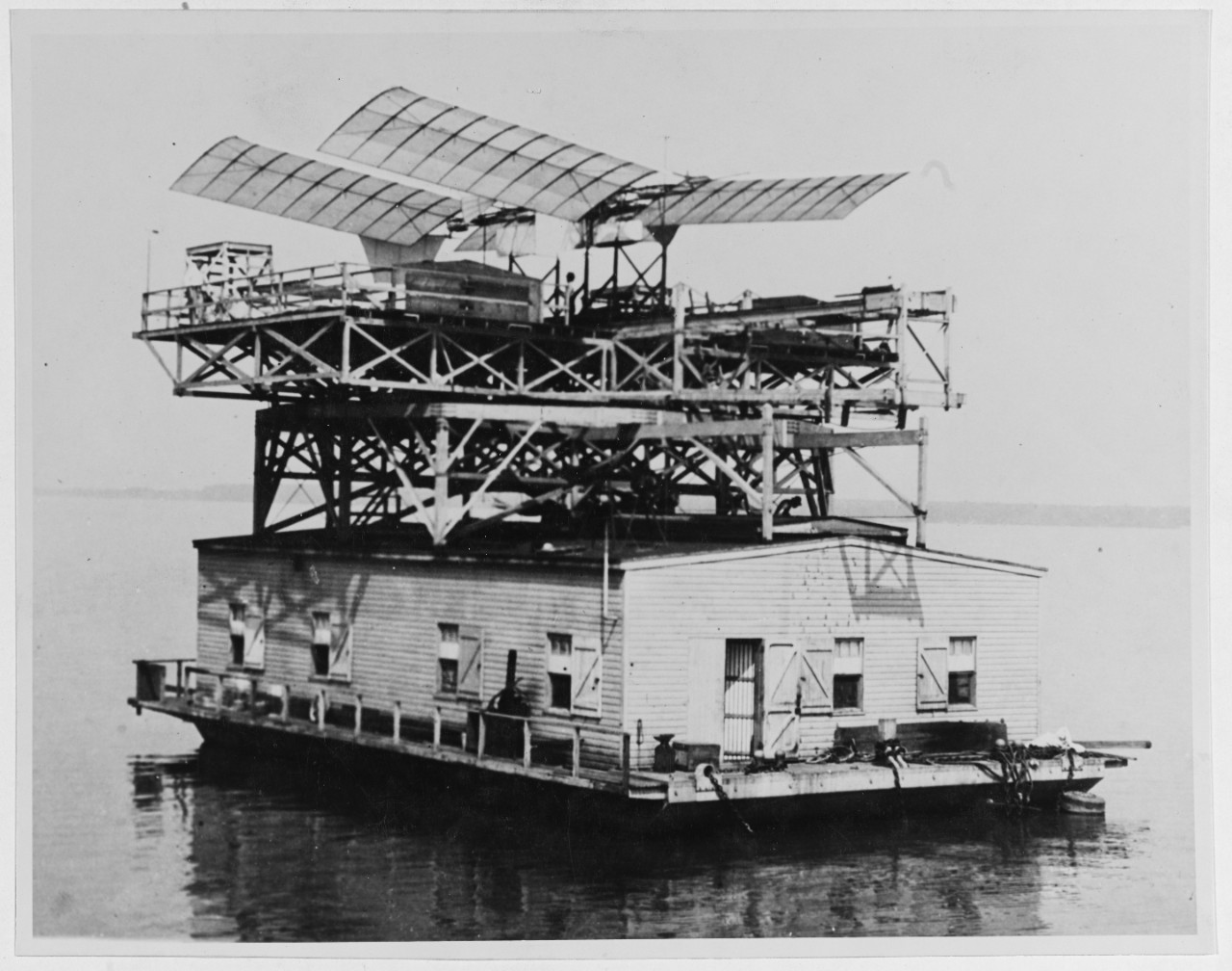 Langley's Full Size Man-carrying Aerodrome on the houseboat in the Potomac River, October 7, 1903. 