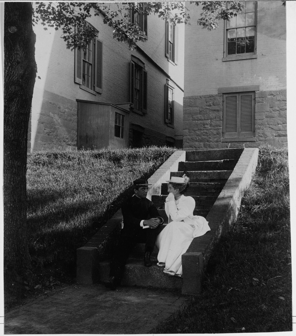 Midshipman Charles E. Gilpin with lady at Naval Academy, Annapolis, Maryland, 1892-1896.