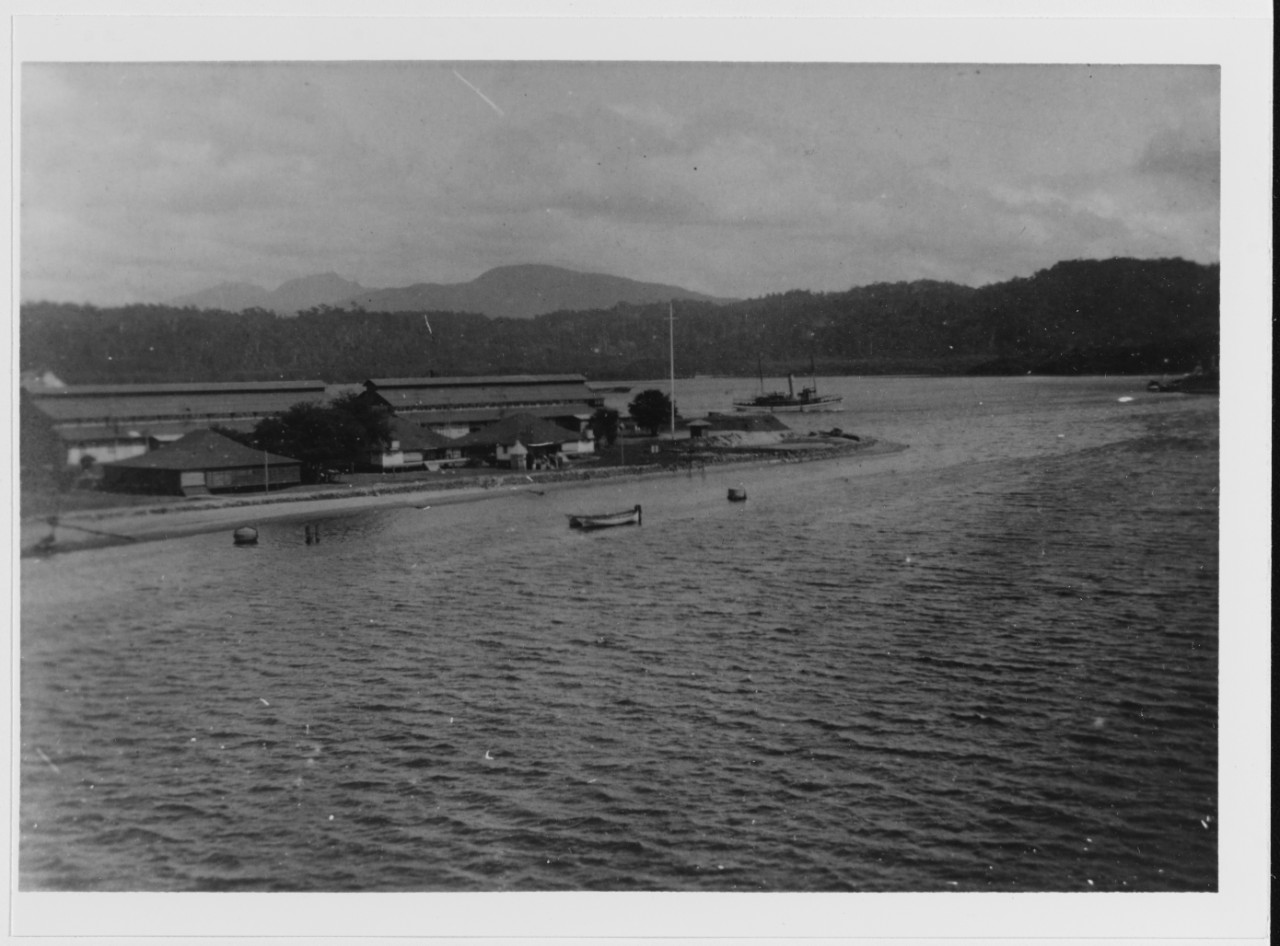Olongapo Naval Station, Philippines. Photographed circa 1908 with Tug USS WOMPATUCK (YT-27) steaming around the point at right center