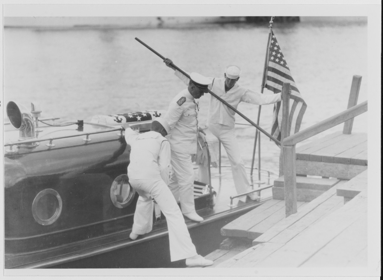 Admiral Mark L. Bristol, Commander-in-Chief, U.S. Asiatic Fleet, leaving his barge to come ashore at Zamboanga, Mindanao, Philippine Islands, June 21, 1929